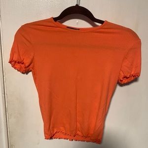 Popular brand, size small, coral color